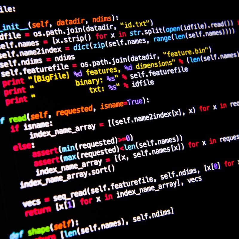 Colour-highlighted source code on a screen
